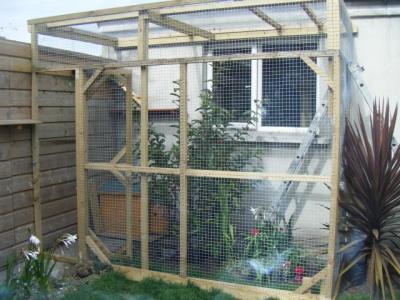 Enclosure outside garage