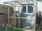 Enclosure outside garage